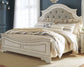 Realyn  Upholstered Panel Bed With Mirrored Dresser And Chest