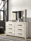 Cambeck Queen Panel Bed with 4 Storage Drawers with Mirrored Dresser