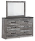 Bronyan King Panel Bed with Mirrored Dresser, Chest and Nightstand